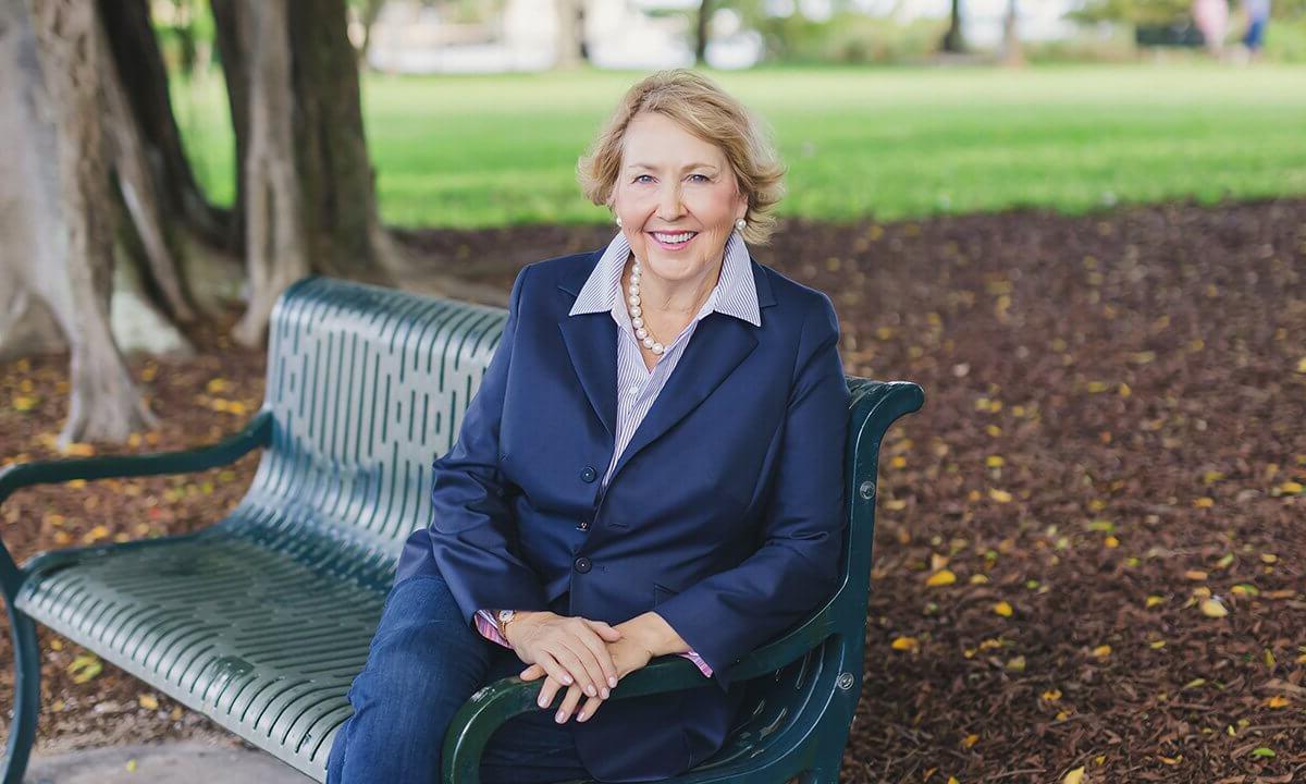 Woman sitting on bench